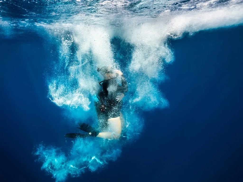 Abyss divers preparing for repetitive boat diving