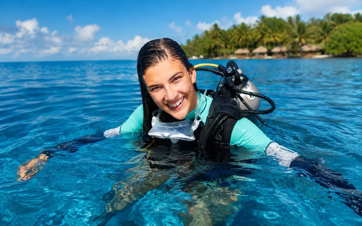 Diver smiling at the surface in clear tropical water