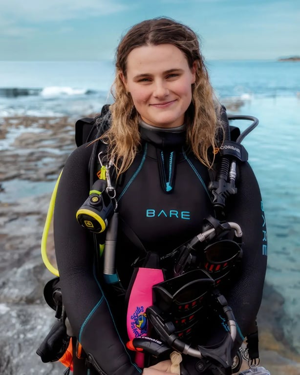 Divers preparing to enter the water at a Sydney dive site