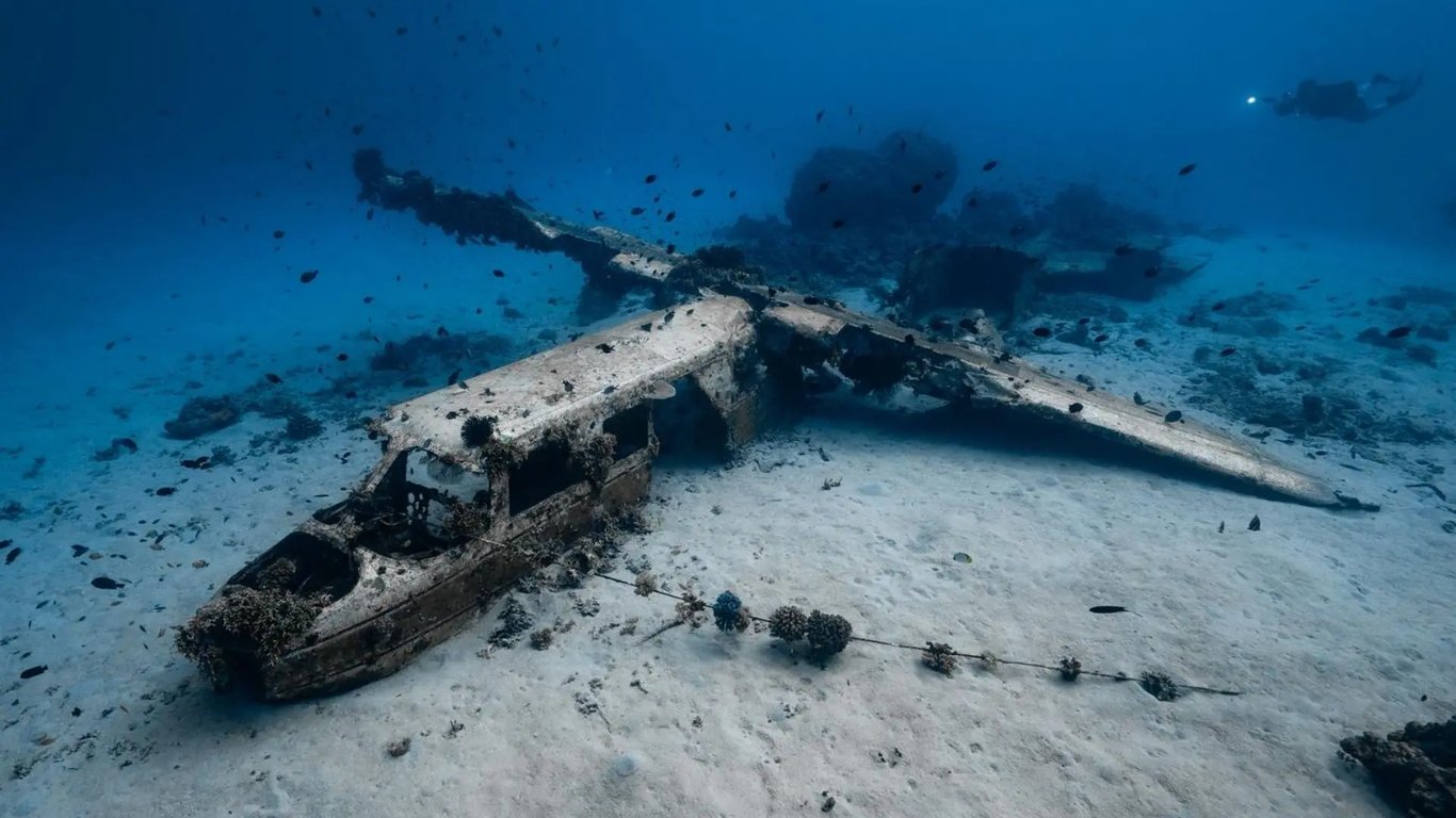 Trislander YJ-RV3 aircraft wreck resting on white sand off Lelepa Island, Vanuatu