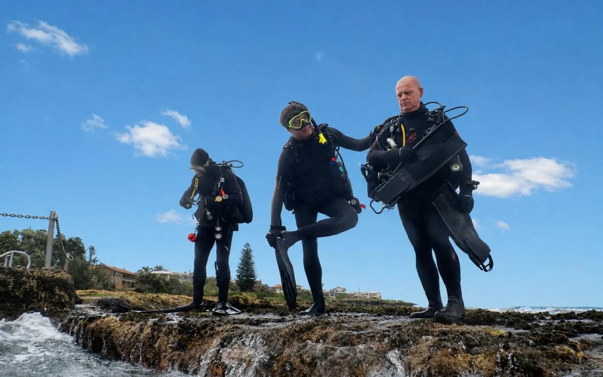 Newly certified divers completing a supported Sydney shore dive