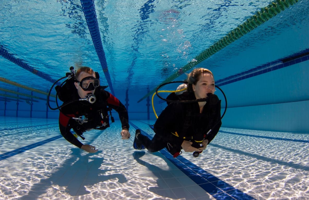 A  students diver is practicing safety skills with an instructor