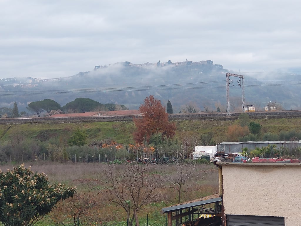 The commune of Magliano Sabina, visible through the morning fog