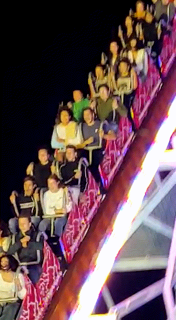 Me going down the drop of a fair ride