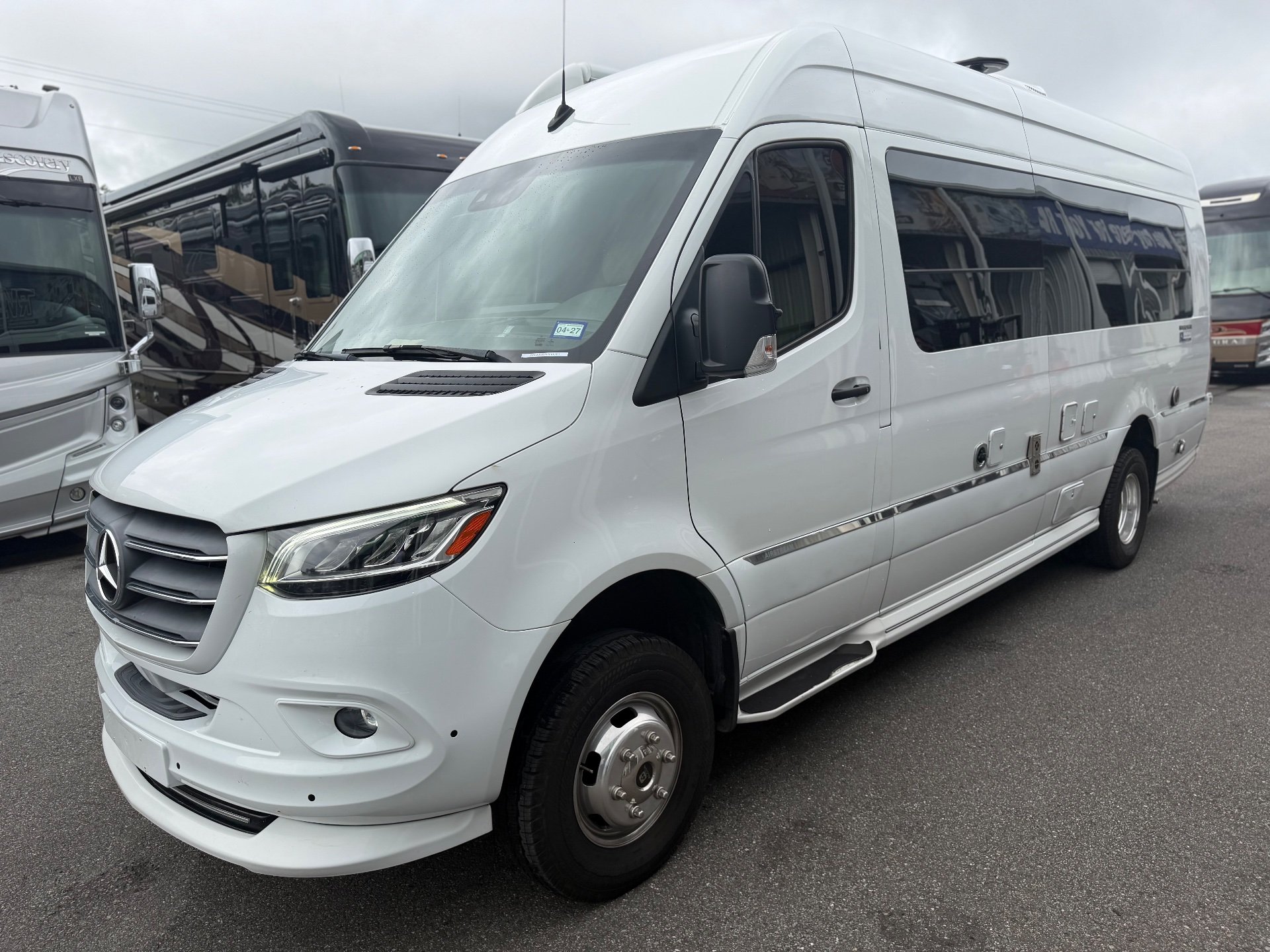 2020 Airstream Interstate 24GL 4WD — The RV's exterior front and passenger side