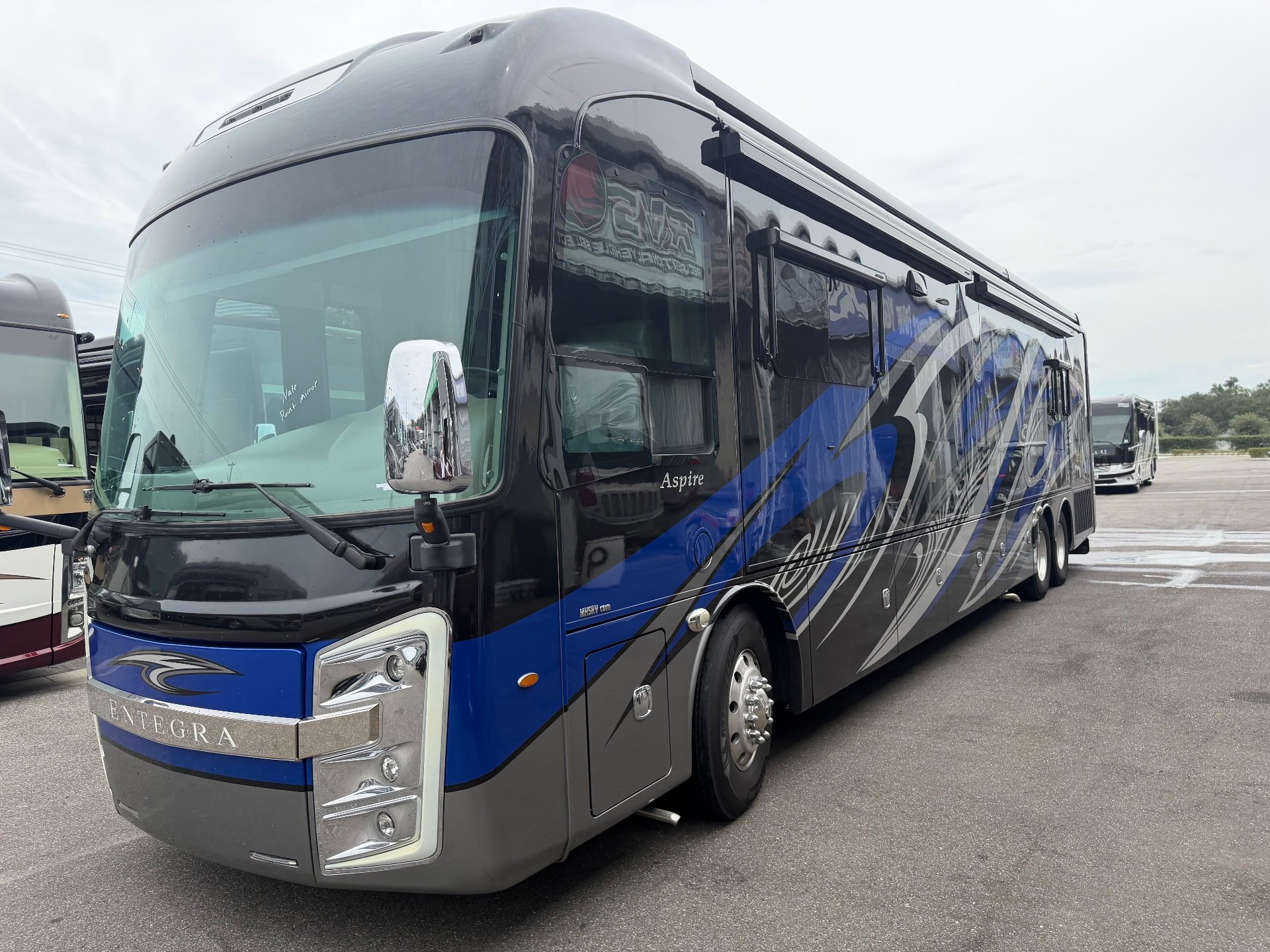 2020 Entegra Coach Aspire 44R — The front and passenger-side exterior of the motorhome