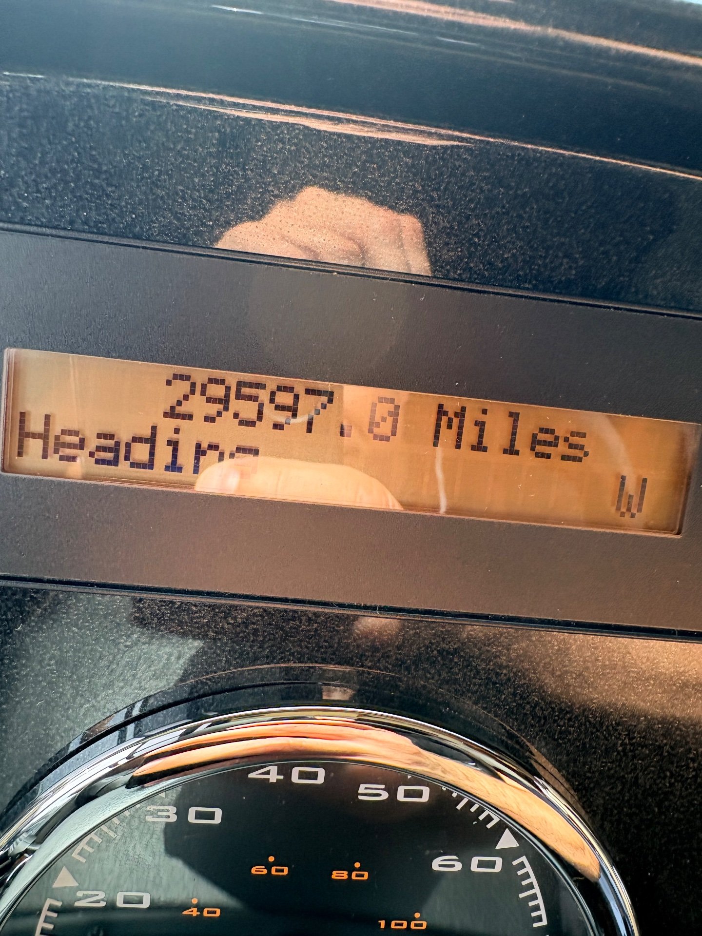 2017 Newmar Dutch Star 4369 — Class A motorhome dashboard detail with digital odometer display and partially visible chrome-ringed speedometer