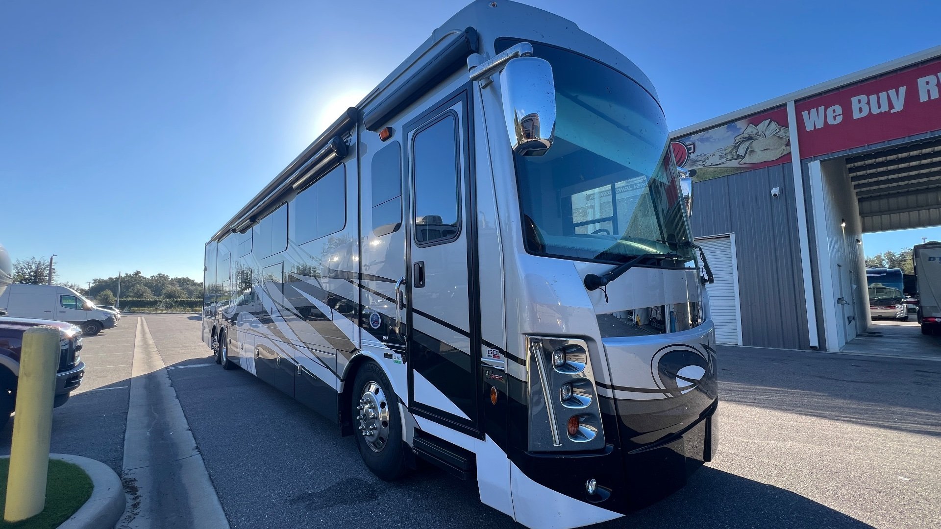 2024 Forest River Berkshire XLT 45CA — The front and side exterior of a Berkshire motorhome parked outdoors