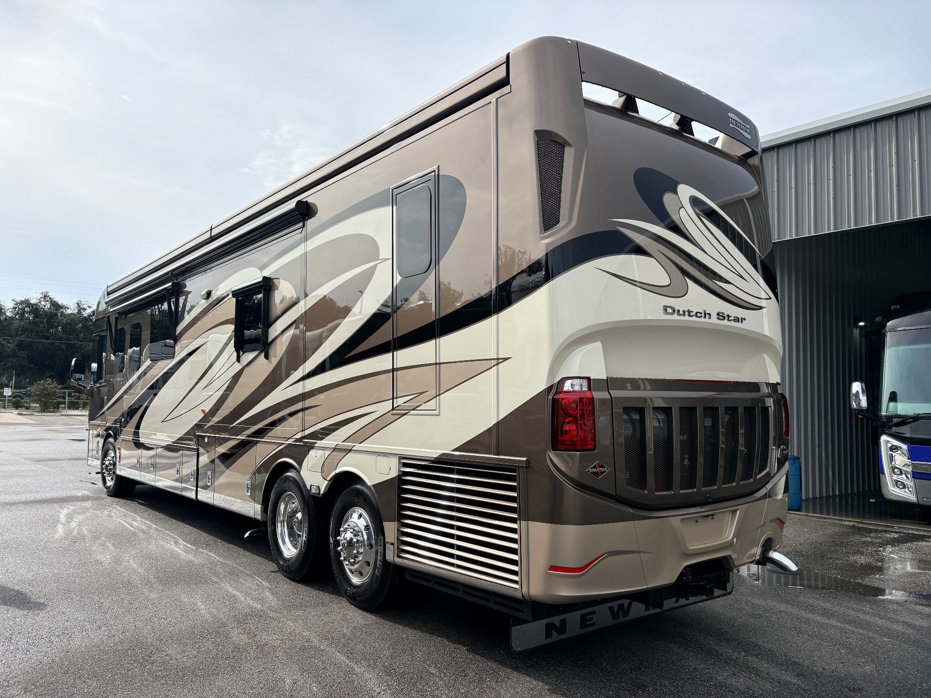 2017 Newmar Dutch Star 4369 — Photograph clearly shows the rear and side exterior of the motorhome, including body panels and wheels