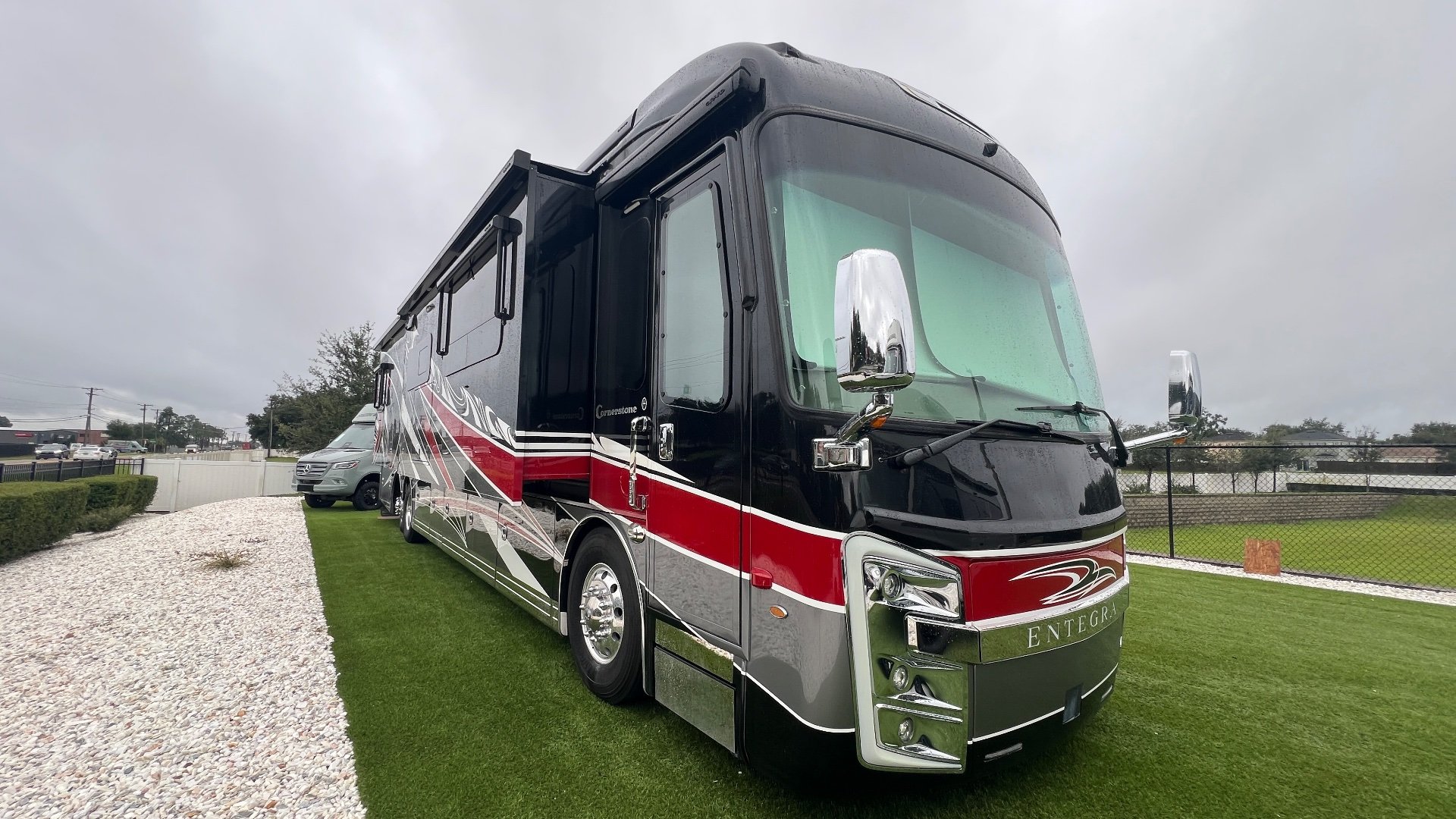 2021 Entegra Coach Cornerstone 45B — The front and driver-side exterior of a motorhome