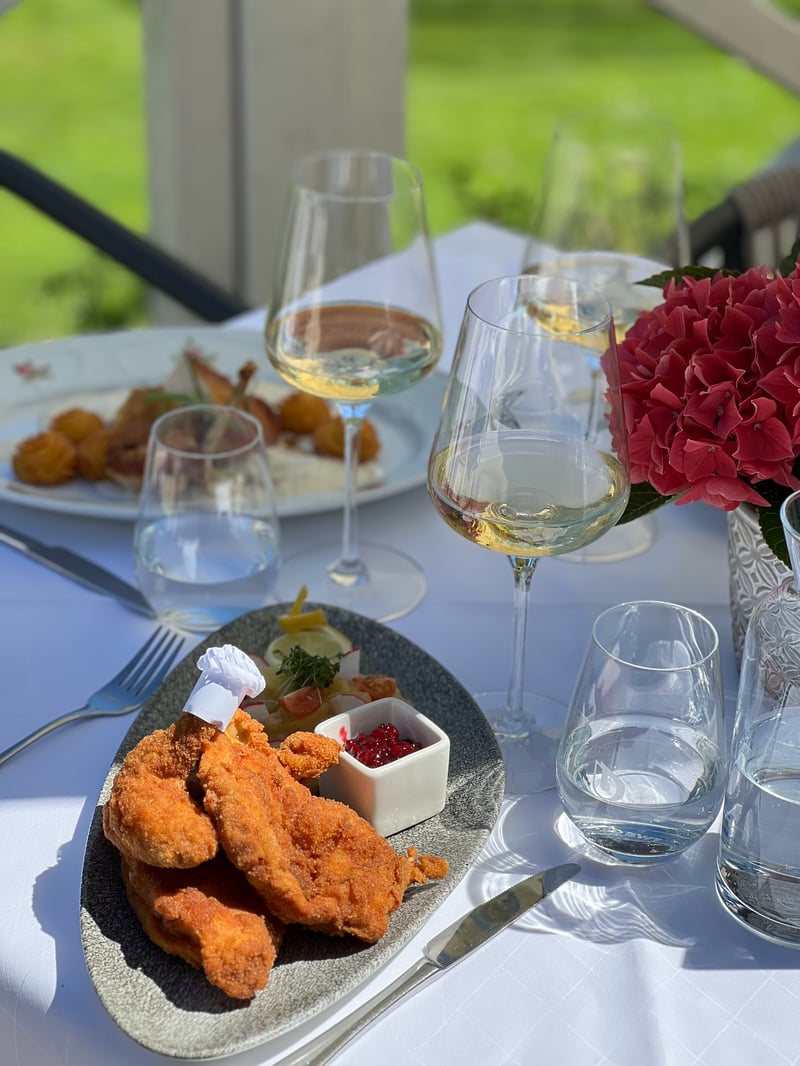 Hubers im Golfclub Klessheim – Restaurant mit Blick auf den Golfplatz