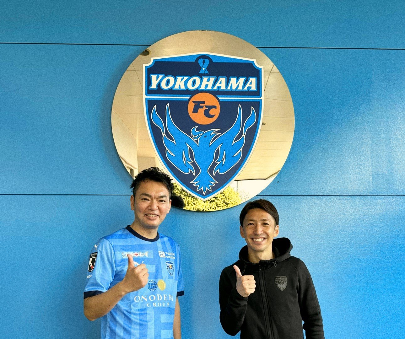 From left, Kenji Ota, Executive Director and President of CODE Meee, and Tomohisa Uchiyama, Club Relations Officer of Yokohama FC