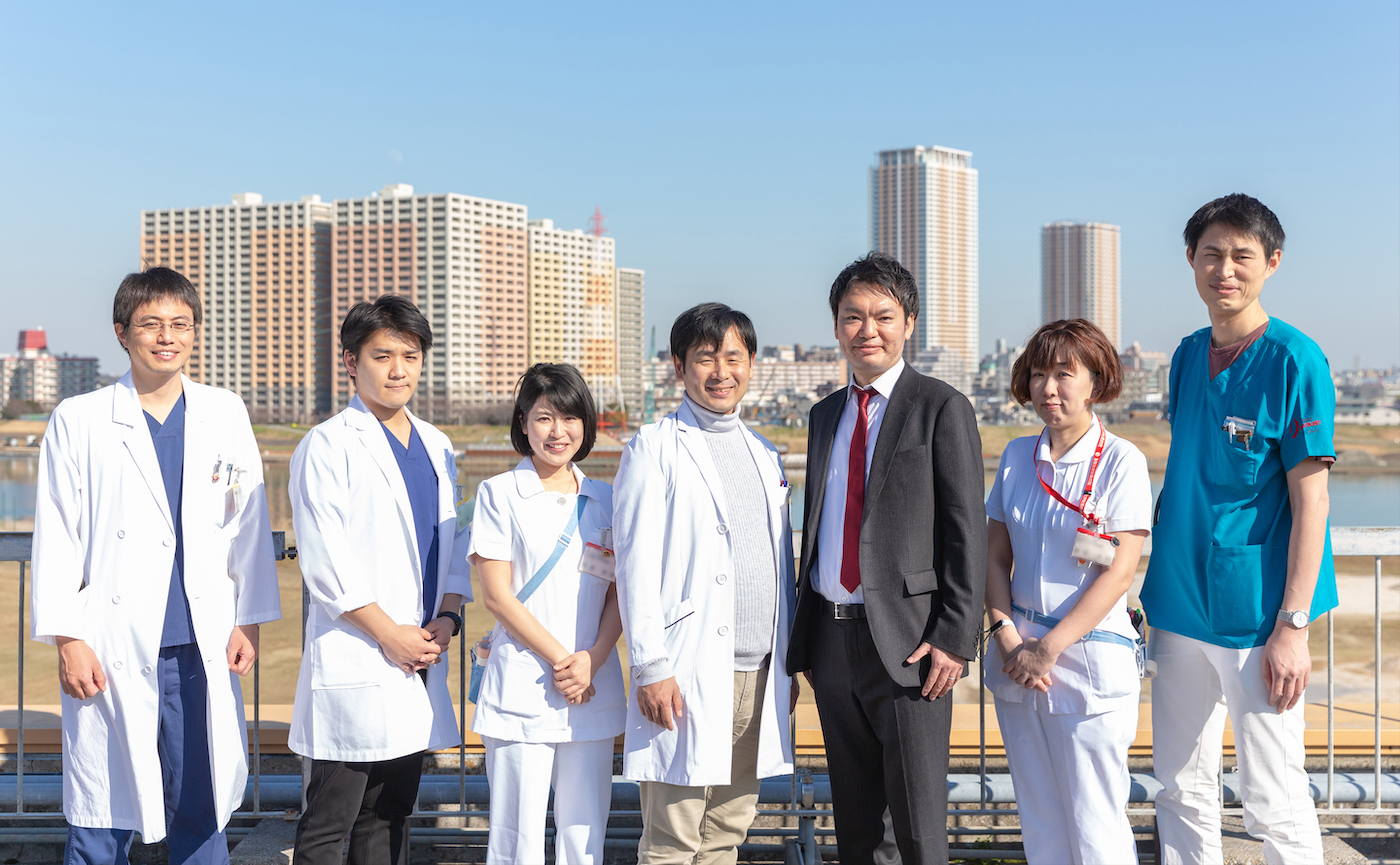Photo of Edogawa Hospital staff and Kenji