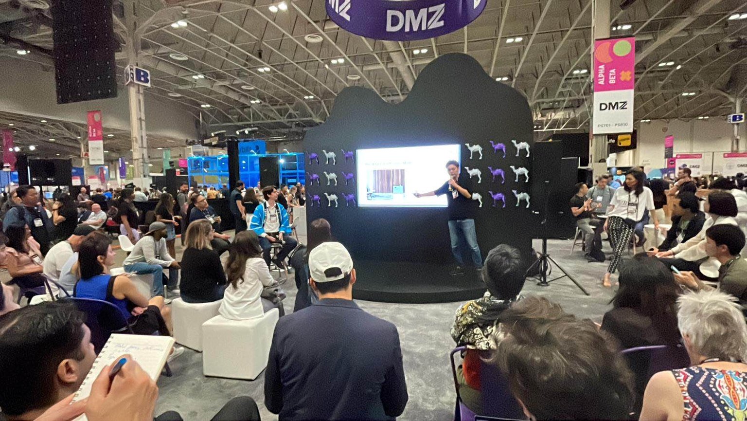 Photo of Ota presenting at COLLISION