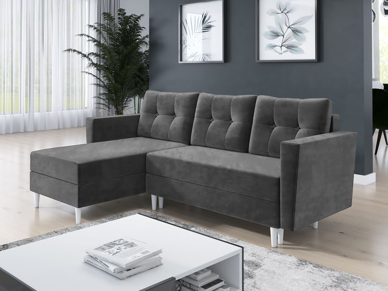 Corner Sofa Bed OTIS Dark Grey in left orientation in a living room.