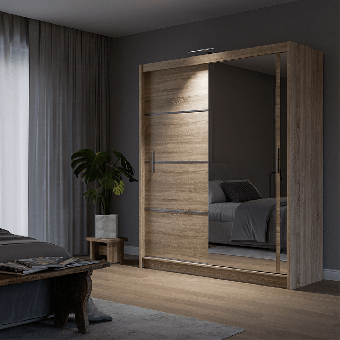 The sliding door VISTA 180cm oak sonoma displaying the LED in a cosy bedroom.