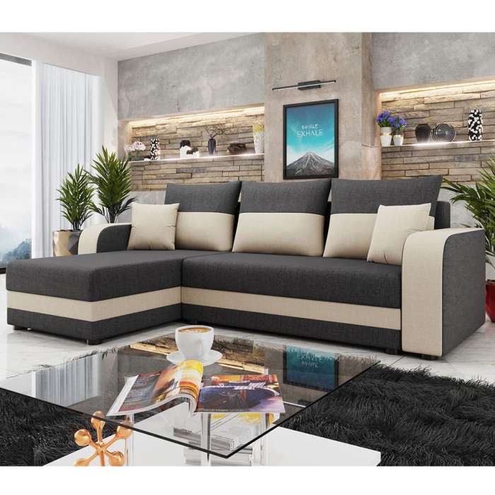 Folded corner sofa in dual-tone upholstery in a cosy living room.