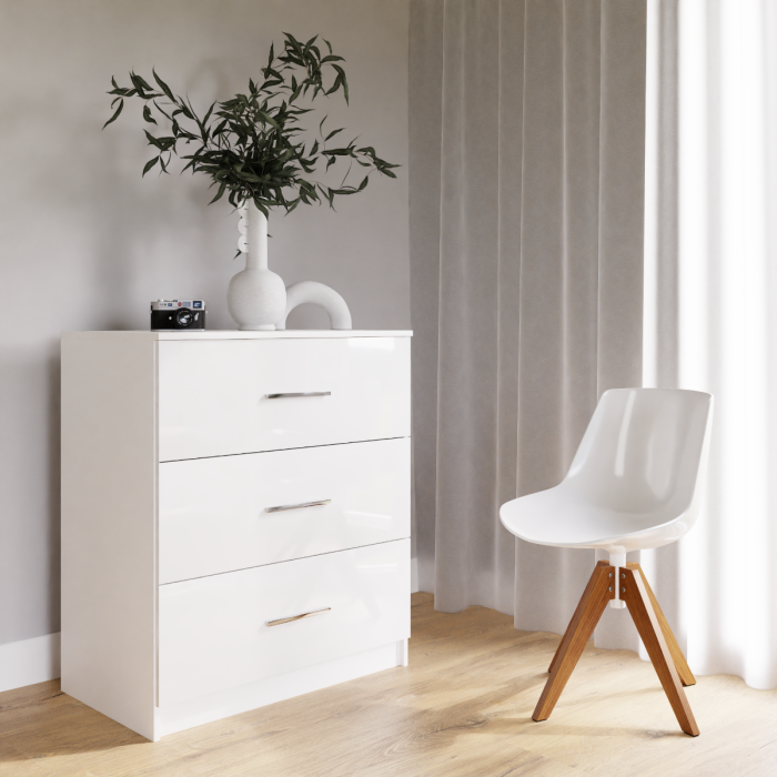The MARSYLIA chest of drawers white gloss with 3 drawers in a cosy bedroom.