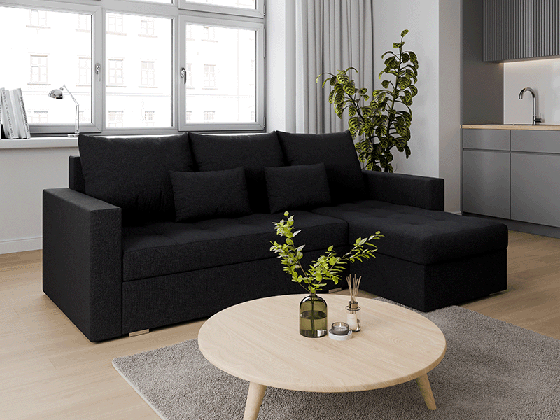 Folded corner sofa bed FOSTER black, right corner in beautiful and cosy living room.