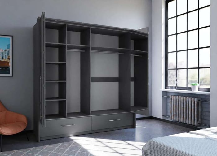 The interior of the TOLEDO 210 wardrobe graphite presenting 6 shelves, 2 hanging rails, and 2 exterior drawers with the bi-folding doors, 