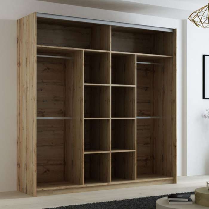 The interior of the PRAGA 200cm wardrobe oak wotan presenting configuration of 4 hanging rails and 10 shelves.