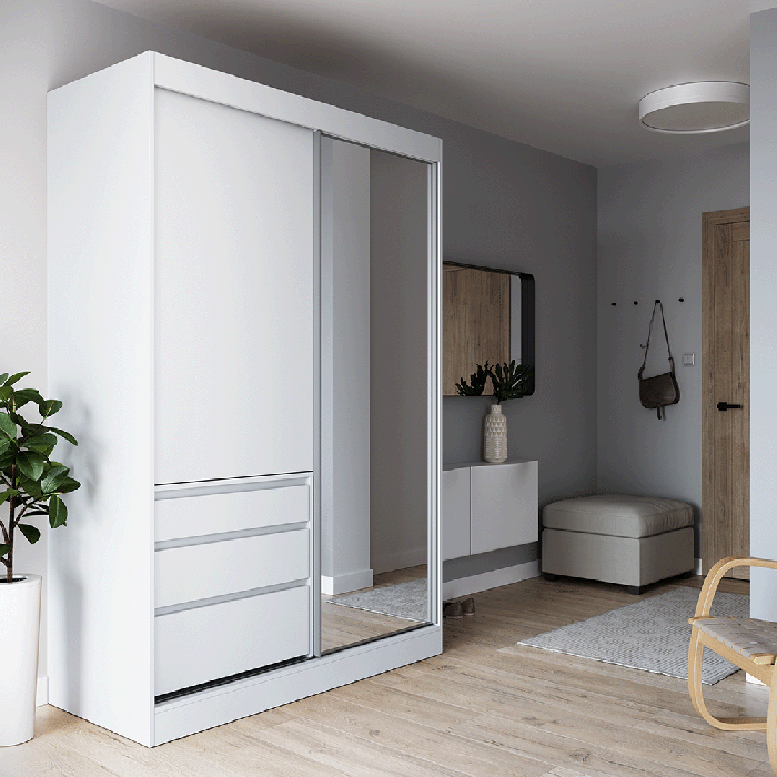 The sliding door wardrobe HAIDAR 140 white with mirrored door in a cosy bedroom.