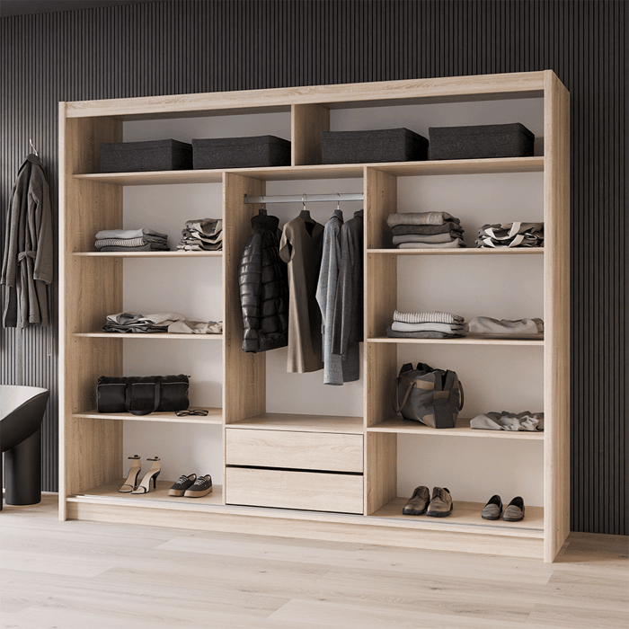 The interior of the MONAKO 250cm wardrobe presenting 8 shelves, 1 hanging rail and 2 drawers