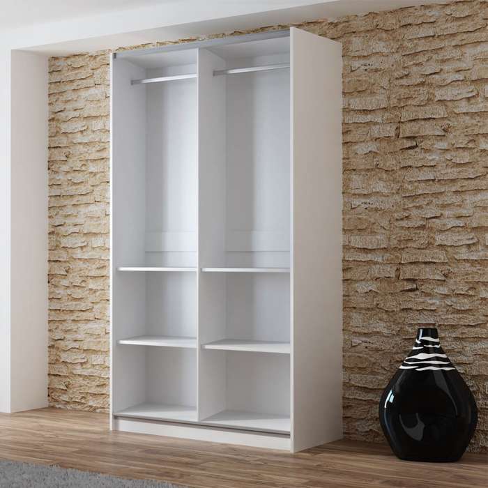 The interior of the VIGO 120cm wardrobe presenting a hanging rail and 2 shelves on each side of the wardrobe
