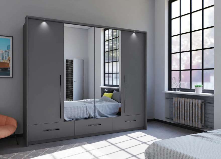 The bi-folding door TOLEDO 255cm Wardrobe graphite with mirrored doors and LED lights in a cosy bedroom.