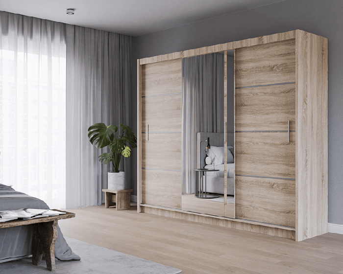 The sliding door VISTA 250cm oak sonoma with mirrored door in a cosy bedroom.
