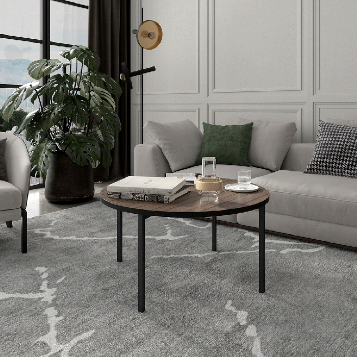 The coffee table SONIA C in a ligniform design in a cosy living room.