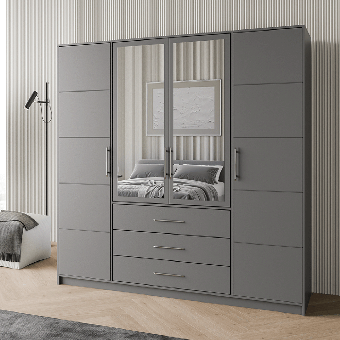 The BALI D4 wardrobe in graphite in a modern living room.