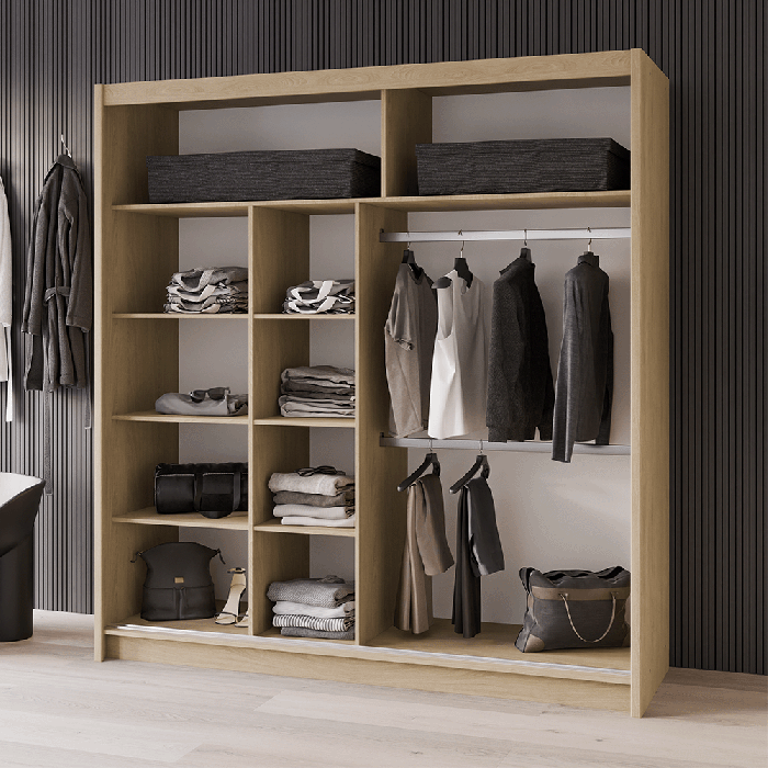 The interior of the VISTA 203cm wardrobe white presenting 2 hanging rails and 8 shelves. 