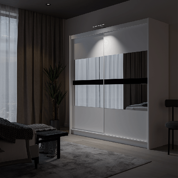 The sliding door BATUMI 203cm white displaying the LED in a cosy bedroom.