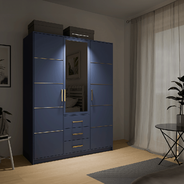 Wardrobe BALI D3 in blue with single LED in cosy bedroom.