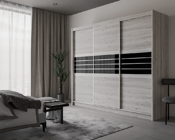 TURYN 250cm sliding door wardrobe oak craft / graphite glass in a cosy bedroom.
