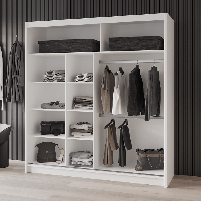 The interior of the VISTA 203cm wardrobe white presenting 2 hanging rails and 8 shelves. 