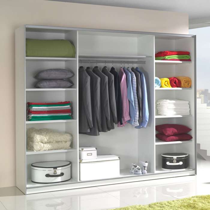 The interior of the LUX STRIPES white wardrobe presenting 9 shelves and 1 hanging rail.