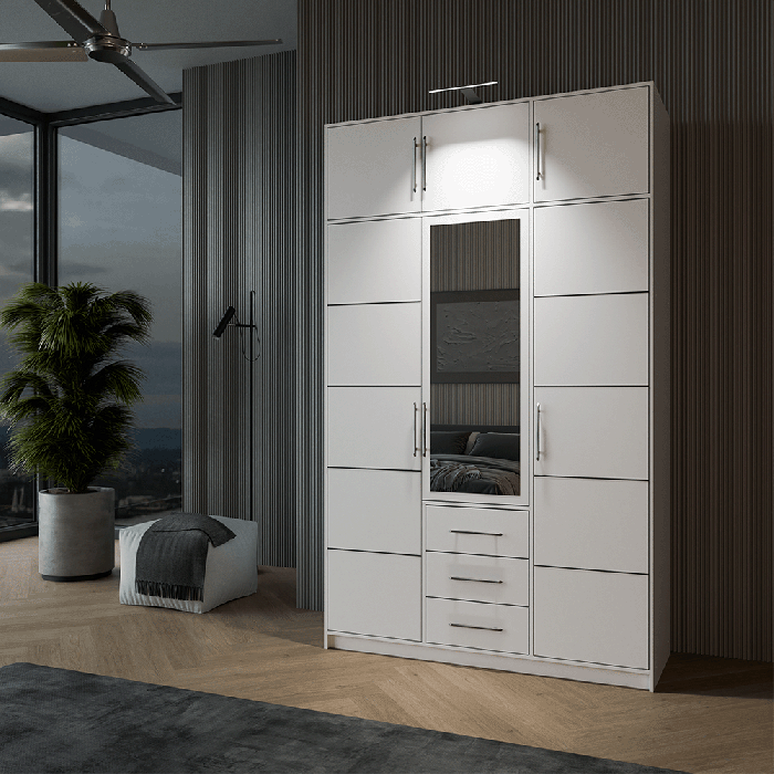 Wardrobe BALI D3 in white with the additional LED light in a cosy bedroom.