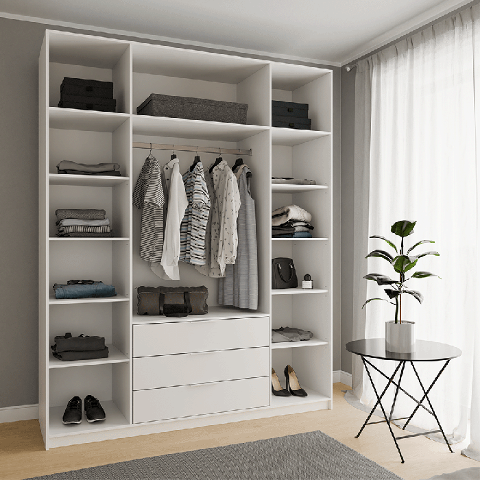 The interior of the BALI D4 wardrobe presenting 8 shelves, 1 hanging rail and 3 drawers in a modern arrangement.