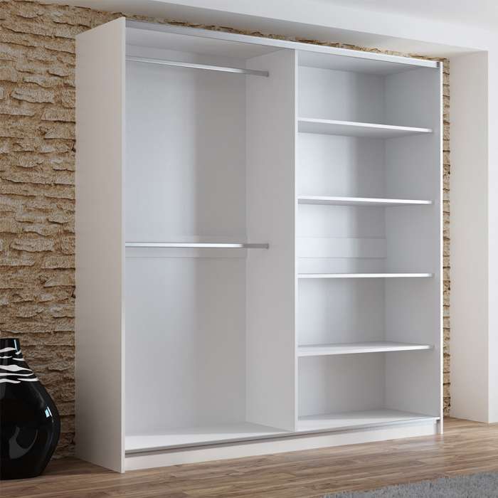The interior of the VIGO 200cm wardrobe presenting 2 hanging rails on the left, and 4 shelves on the right