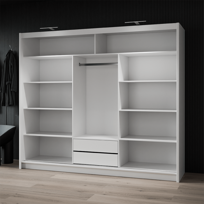 The interior of the MALIBU wardrobe presenting 8 shelves, a hanging rail and 2 drawers, with LED lights
