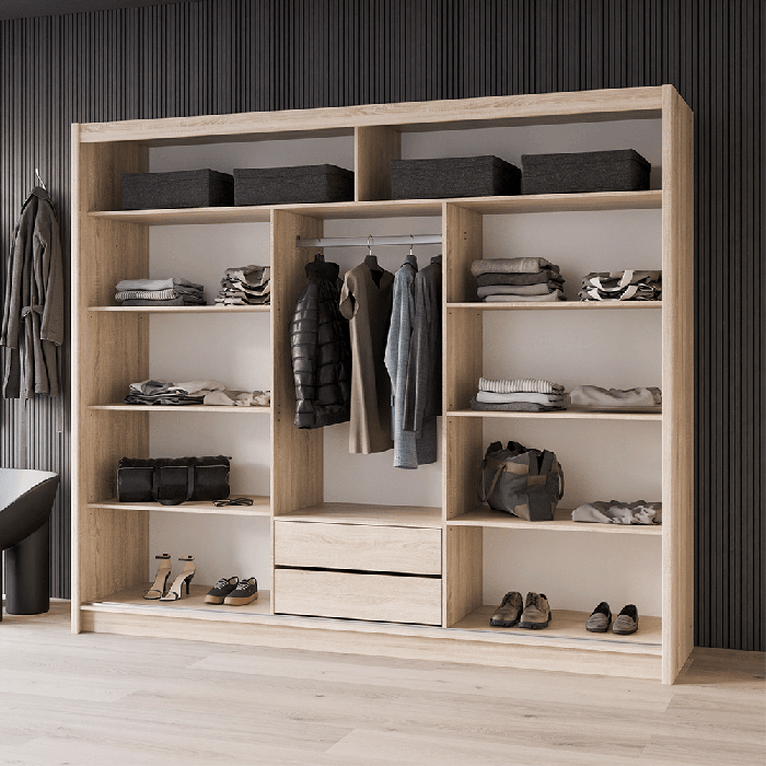 The interior of the VISTA 250cm wardrobe oak sonoma presenting 1 hanging rail, 8 shelves and 2 drawers.