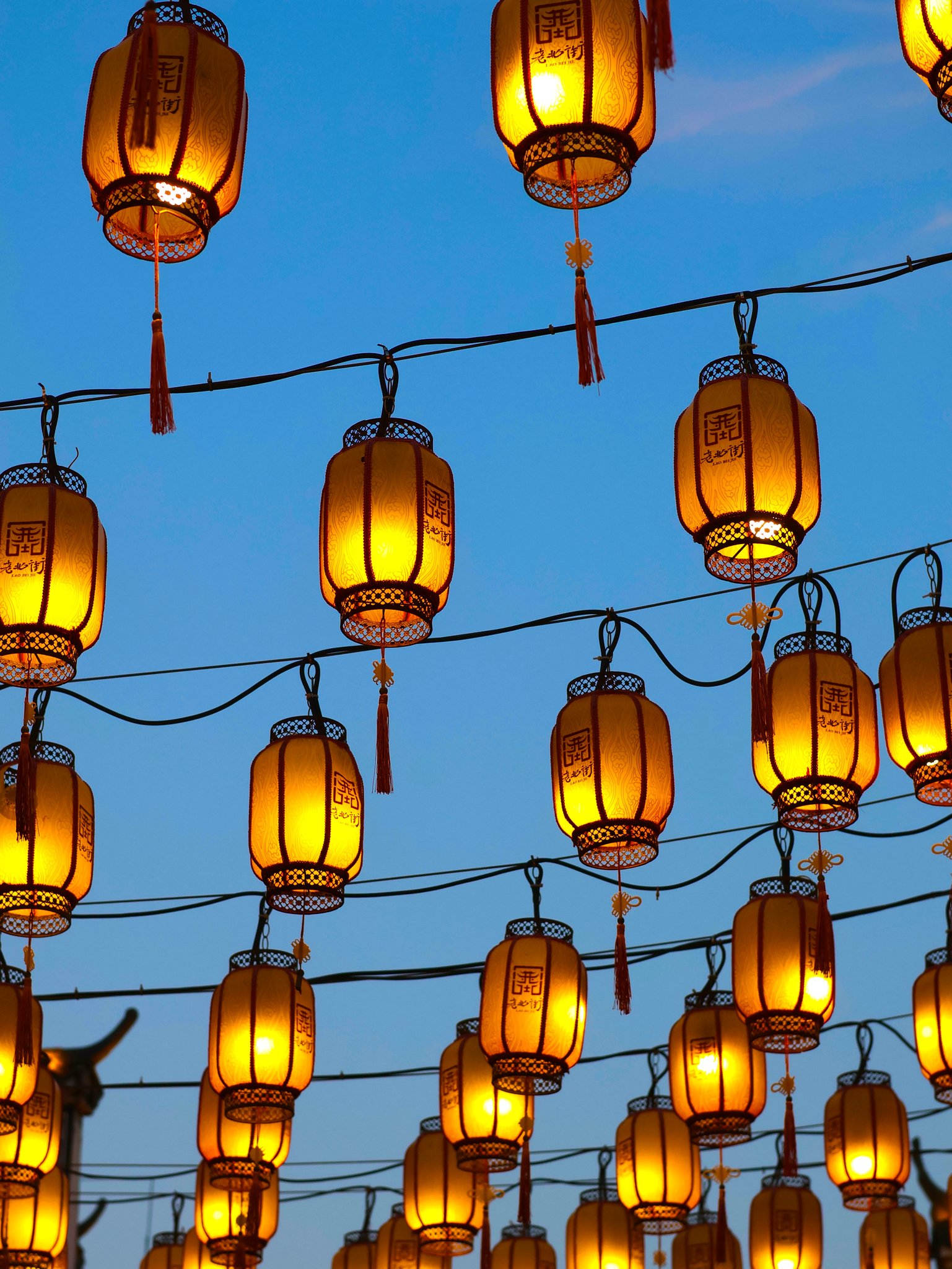 some sections of leping's old pedestrian street are covered by many rows of lanterns