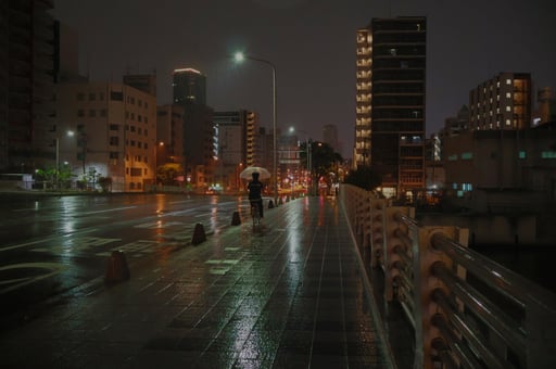 a rainy bridge in osaka