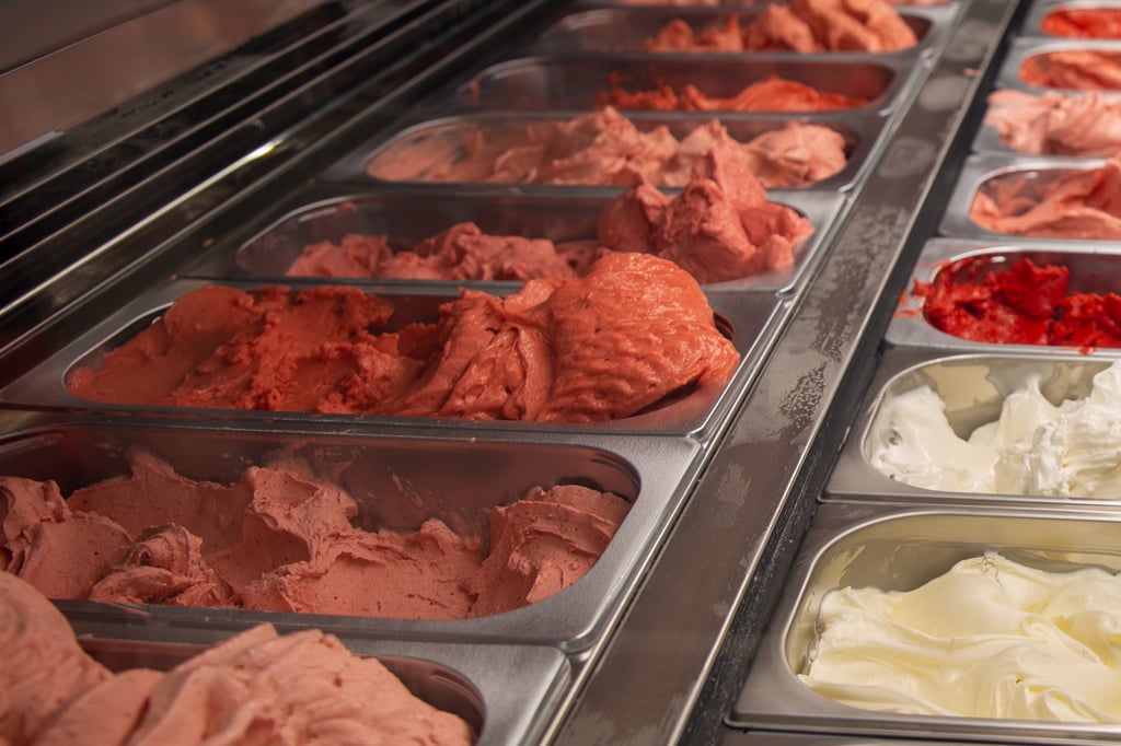 One of the chests of the competition full of different varieties of strawberry and yoghurt ice cream.