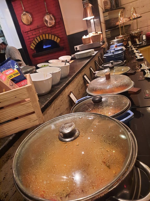 Buffet dishes at Hilton Mumbai International Airport in Mumbai - BookMyBuffet