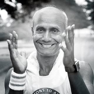Sri Chinmoy Marathon Team logo