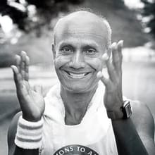 Sri Chinmoy Marathon Team logo
