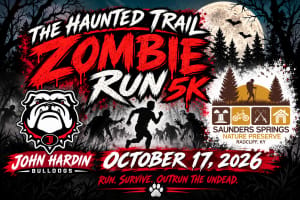 THE HAUNTED TRAIL: ZOMBIE RUN 5K Logo